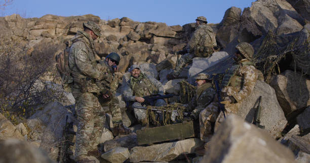 istock Soldiers taking a break from patrol 1074937338