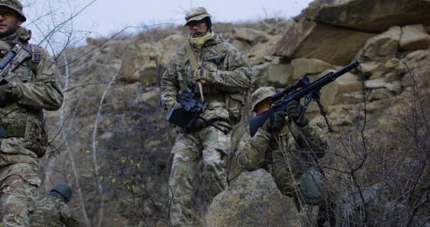 istock Soldier providing cover during patrol 1074937492