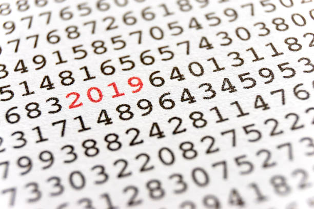 istock Printed random numbers and the number 2019 in red 1074937704