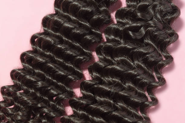 Deep Curly Black Human Hair Weaves Extensions Bundles Upon Pink Background Stock Photo - Download Image Now - iStock Deep Curly Black Human Hair Weaves Extensions Bundles Upon Pink Background Stock Photo - Download Image Now - iStock