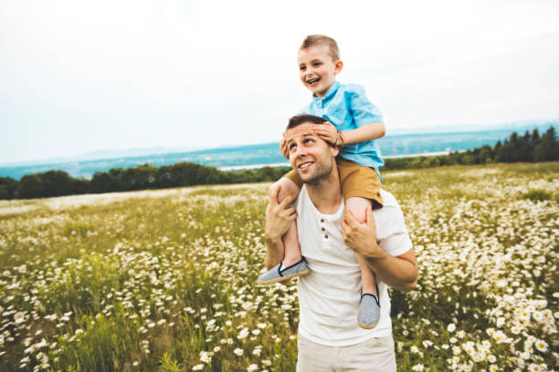 istock Father spending time with son during the sunset. 1074948806