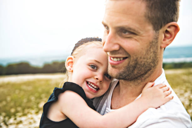 istock Father spending time with daughter during the sunset. 1074949186