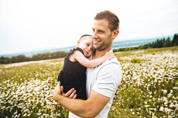 istock Father spending time with daughter during the sunset. 1074949226