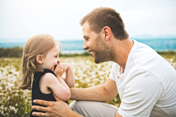 istock Father spending time with daughter during the sunset. 1074949304