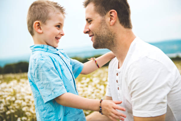 istock Father spending time with son during the sunset. 1074949376