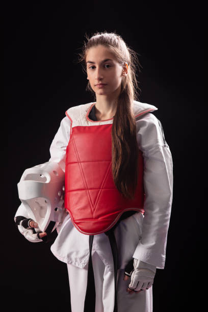 istock Young girl practicing martial arts 1074956866