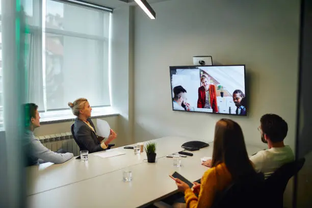 Photo of Business People Having a Video Call