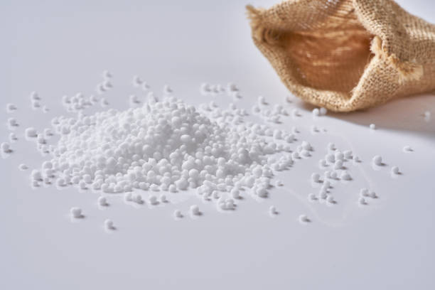 istock Chemical fertilizer on white background 1074959622