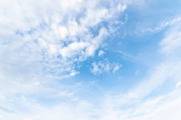 istock Blue sky with white clouds floating in the sky. 1074960058