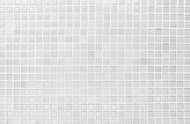 istock White and Grey the tile wall high resolution real photo or brick seamless and texture interior background. 1074961966