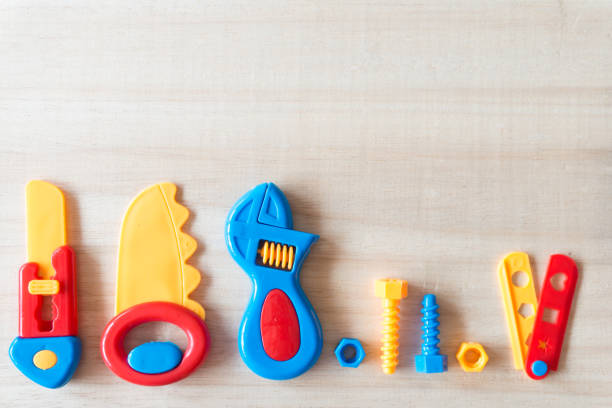 istock tool supplies on wood background 1074963918