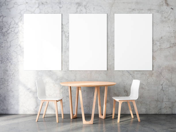 istock Three Vertical Posters Mockup with Two wooden chairs and table in empty room 1074966272