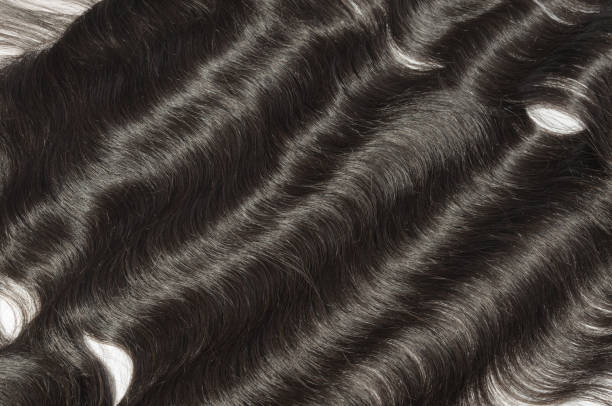 istock Body wavy black human hair weaves extensions lace frontal closure 1074969172