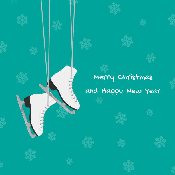 istock New Year card with white skates hanging on laces. 1074971984