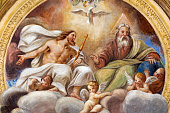 Parma -  The ceiling freso of The Holy Trinity in church Chiesa di Santa Croce by Giovanni Maria Conti della Camera (1614 - 1670).