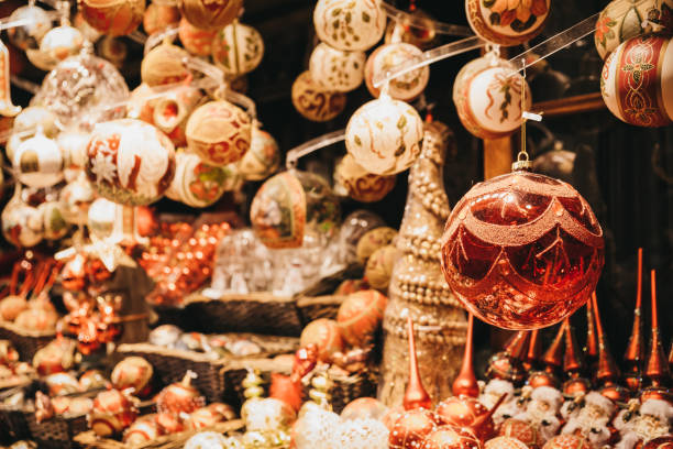 istock Christmas tree decorations on sale at a Christmas market. 1074981098