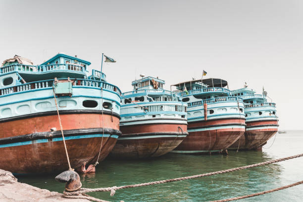 Cargo ships which are used for transportation between Yemen and Djibouti moored in the port.