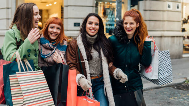 istock Girls returning from shopping 1074983710