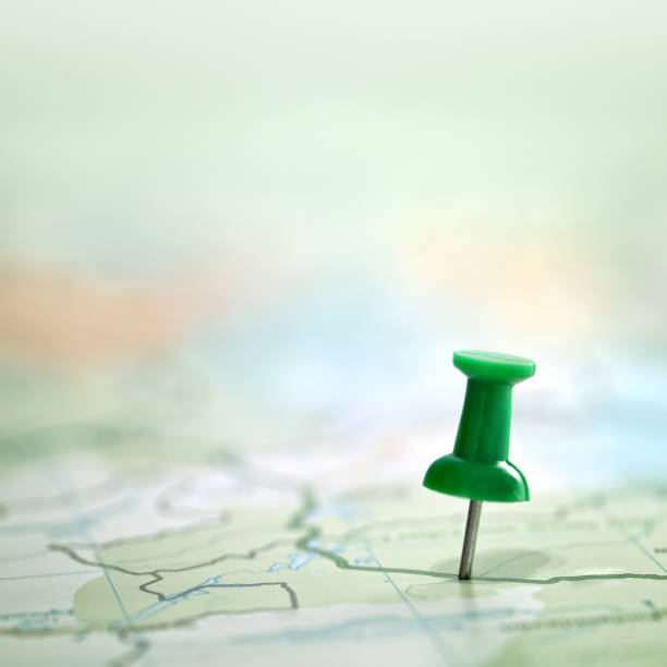 istock Thumbtack showing destination location on map with copy space 1074983776
