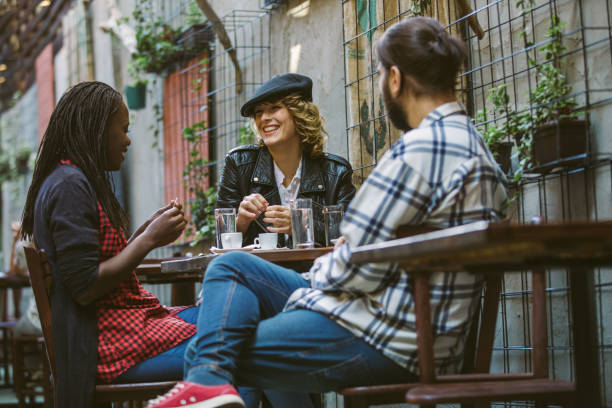 istock Happy Friends On Coffee Break 1074985862