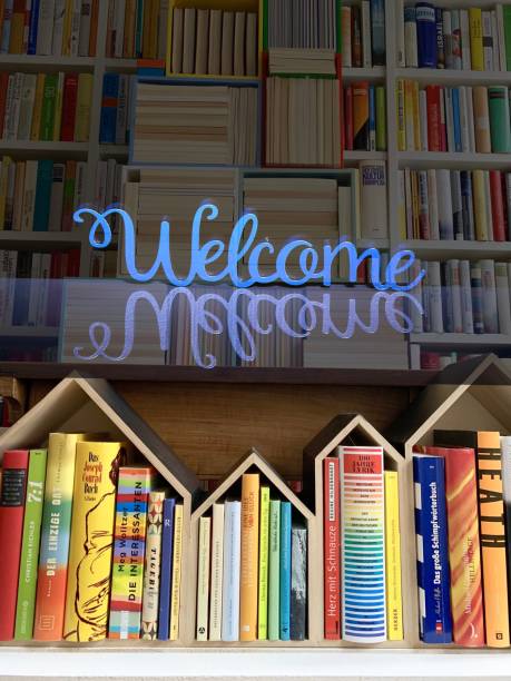 istock Welcome sign on books background 1074994488