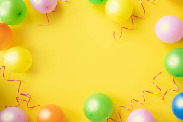 istock Holiday frame or background with colorful balloon. Copy space. 1074997842
