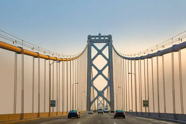 crossing the New bay suspension bridge in San Francisco in late afternoon.
