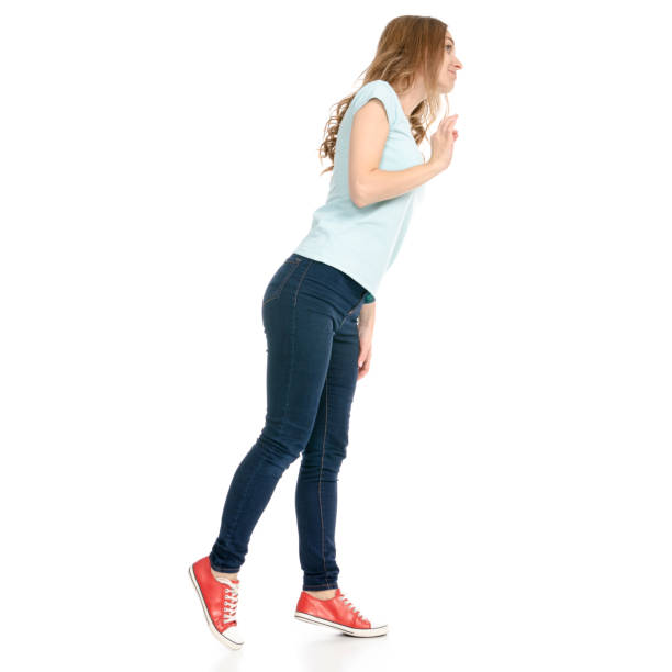 istock Beautiful woman in jeans looks 1075002900