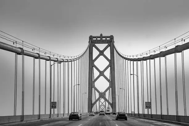 crossing the New bay suspension bridge in San Francisco in late afternoon.