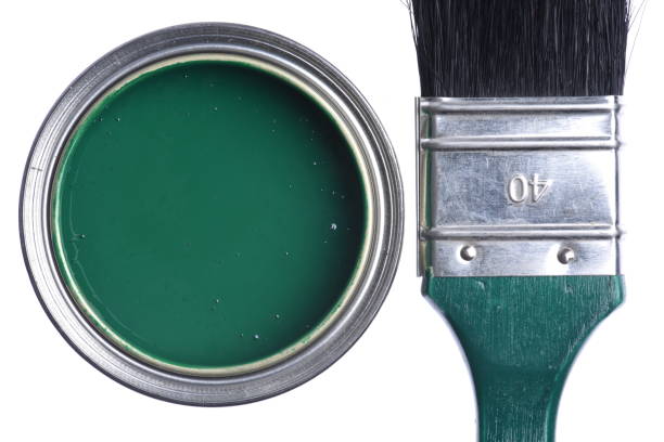 istock Green paint can with brush 1075032636