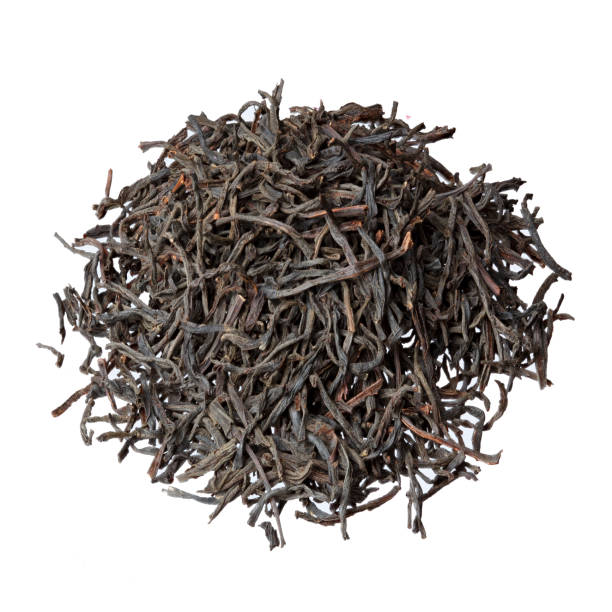 istock Exclusive Dimbula tea heap isolated on white. 1075042750