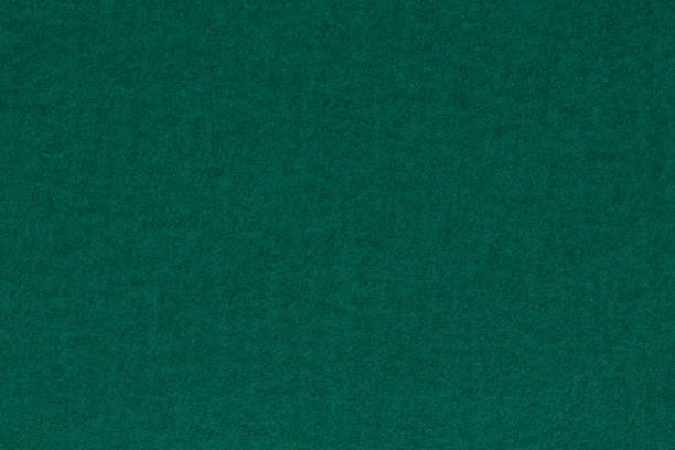 istock Green paper texture on macro. Green board. Chalkboard. 1075043226