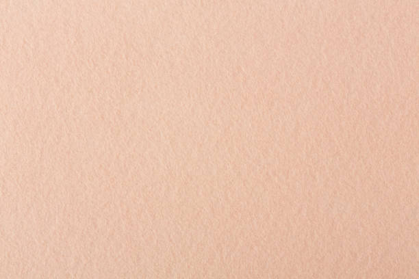 istock Natural high quality beige felt texture on macro. 1075043674