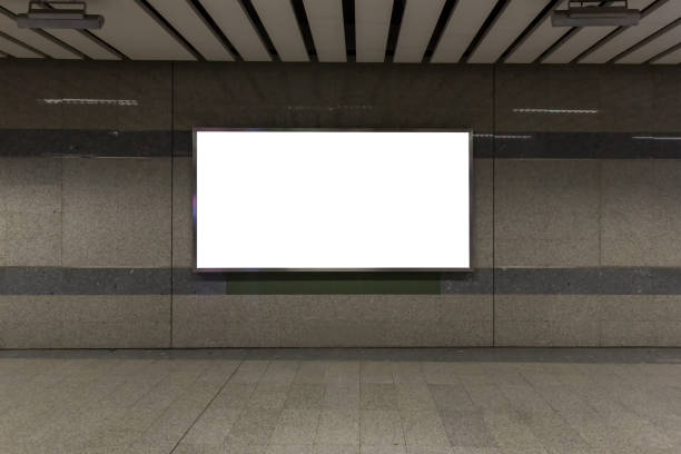 istock interior with blank billboard  on Subway station .Garage underground    blank billboard on the sideway in Subway station. 1075047938