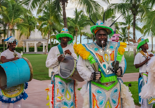 Freeport Bahamas - September 22, 2011: Male dancers dressed in traditional costumes performing at a Junkanoo festival in Freeport, Bahamas