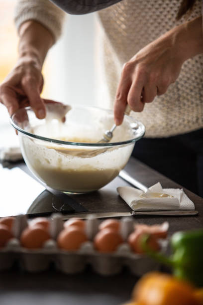 istock Woman mixing batter 1075052628