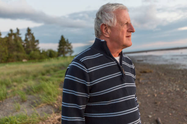 istock Senior Man at the beach having good time 1075056430