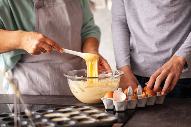 istock Boy helping grandmother in the kitchen 1075068028