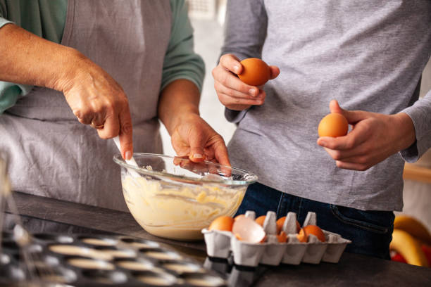 istock Boy helping grandmother in the kitchen 1075068106