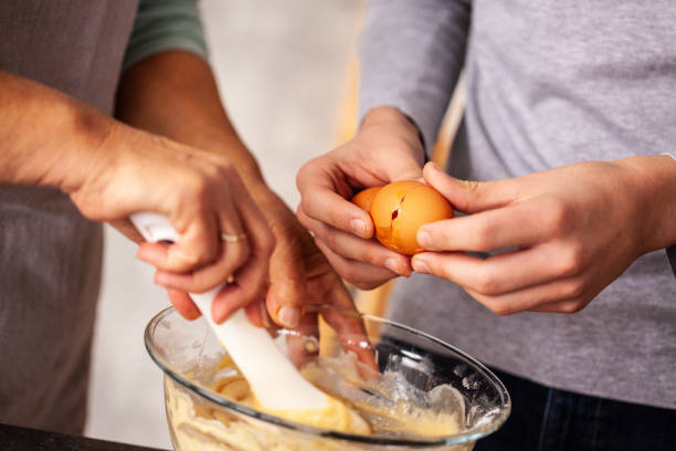 istock Boy helping grandmother in the kitchen 1075068228
