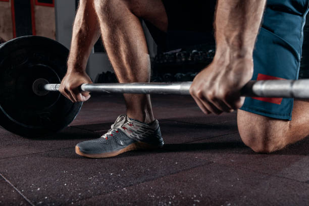 istock Kettlebell training in gym. Athlete doing workout 1075070010