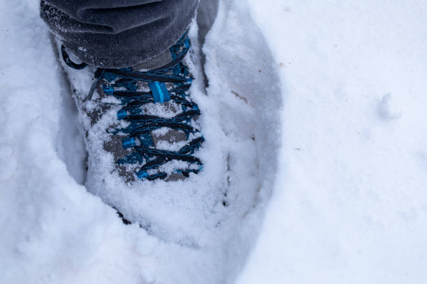 istock man in mountaineer boat in snow 1075082454
