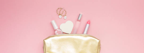 istock Golden female purse with cosmetics 1075083000