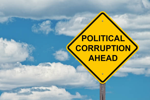 istock Political Corruption Ahead Warning Sign 1075083542