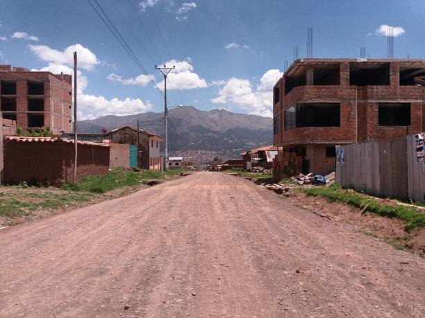 istock road near houses 1075086028