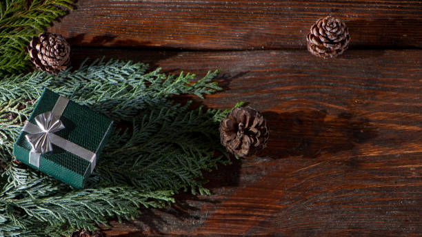 istock New Year's background with gifts, conifer branches. 1075098926
