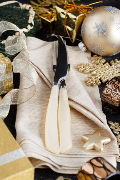 istock Golden and black Christmas Table Setting 1075099498
