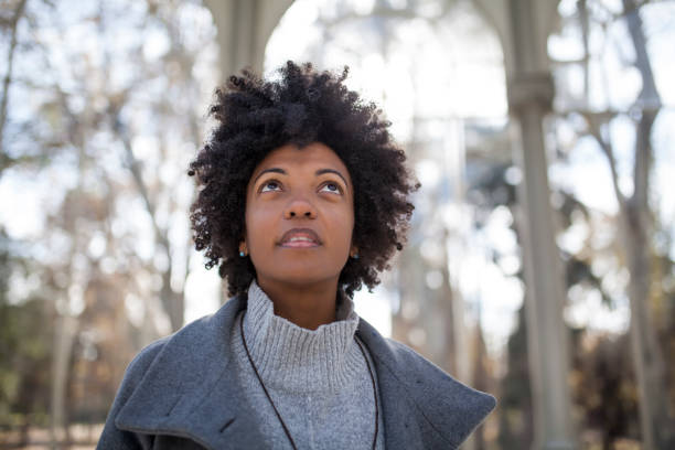 istock Afro woman having fun in the park 1075104652