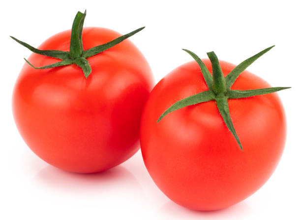 istock Tomato isolated. Tomato with clipping path. Full depth of field 1075114026