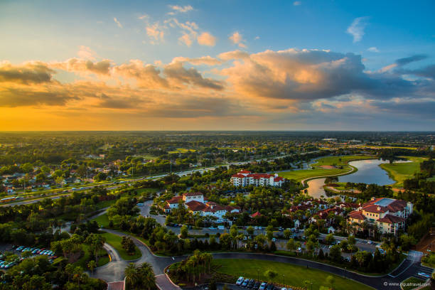 Amazing aerial sunset panorama view Amazing aerial sunset panorama view in Orlando, Florida state. Awesome wallpaper orange sunset. Landscape view. east photos stock pictures, royalty-free photos & images